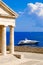 Greek symbol Pantheon near the sea with yacht.