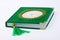 Green Al-Quran on a White isolated backgrou