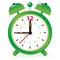 Green alarm clock on white