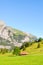 Green Alpine landscape near Kandersteg in Switzerland captured in the summer season. Meadows, rocky hills. Swiss Alps, rocks and