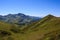 Green alpine meadows in the valley in Caucasus Mountains