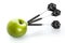 Green apple as a target for black steel darts