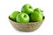 Green apple in basket isolated