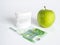 The green apple, the denture and the one hundred euro bill