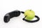 Green apple with handset and connected wire