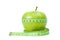Green apple and measurement tape