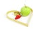 Green apple with a measuring tape and heart symbol isolated