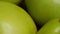 Green apple peel, macro video filming. Apples of the Reinette Simirenko variety, close-up.