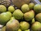 Green apple Raw fruit and vegetable backgrounds healthy organic fresh produce Green apple texture: lots of green apples.