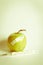 Green apple and thermometer as a natural remedy against flu