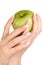 Green apple in woman\'s hands