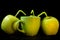 Green apples around a mug of Apple juice