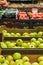 Green apples boxes shelves market on sale