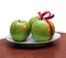 Green apples on the plate