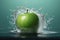 Green apples, water splash