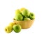 Green apples in a wood basket