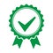 Green approved or certified medal icon in flat design