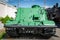 Green armored tracked military tractor