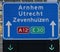 Green arrow above the driving lane indicating that its open on motorway A12 E30 heading Arnhem, utrecht and Zevenhuizen.