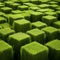 Green artificial grass cubes texture background, close-up, top view