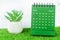 The Green August 2023 Monthly desk calendar for 2023 year on grass