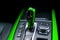 Green Automatic gear stick of a modern car. Modern car interior details. Close up view. Car detailing. Automatic transmission leve