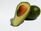 green Avocado halved with core