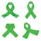 Green awareness ribbons on a white background