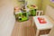 Green baby retro kitchen in children`s room. Children`s room