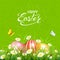 Green background with butterflies and Easter eggs in grass