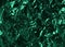 Green background made of crumpled polyethylene. Abstract green texture of crumpled plastic film