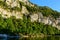The green banks of the Pont dArc in the Gorges de lArdeche in Europe, France, Ardeche, in summer, on a sunny day