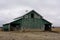 Green barn after a morning dusting