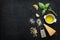 Green basil pesto - italian recipe ingredients on black chalkboard