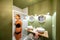 Green bathroom with woman in underwear