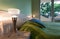 Green bedroom with modern lamps