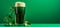 Green beer in a glass with stPatrick s day theme on blurred background for text placement