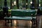 a green bench sitting in the rain on a sidewalk