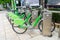 Green bicycle for rent in city