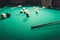 green billiard table with russian pool balls