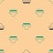 Green and black Adult diaper icon isolated seamless pattern on beige background. Vector