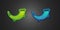 Green and blue Hunting horn icon isolated on black background. Vector