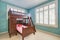 Green and blue kids room with bunk bed