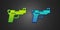 Green and blue Pistol or gun icon isolated on black background. Police or military handgun. Small firearm. Vector