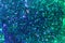 Green and blue slime with glittering particles