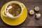 Green borscht with mushrooms. Wooden background. Top view