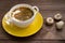 Green borscht with mushrooms. Wooden background. Top view