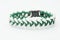 Green braided bracelet on white background