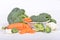 Green broccoli and carrot cut in pieces