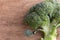 Green broccoli organic vegetable on wood board